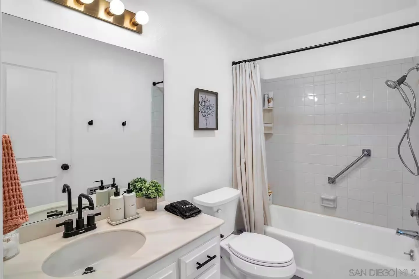 3550 Laketree Drive Fallbrook, CA 92028 - Photo 29 of 56 a bathroom with a sink toilet and shower