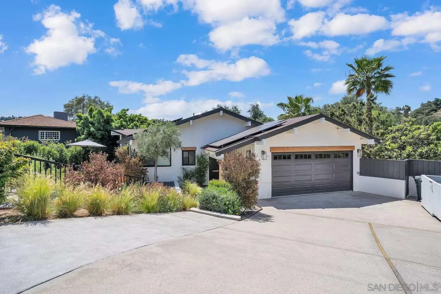 3550 Laketree Drive Fallbrook, CA 92028 - Photo 47 of 56 a front view of a house with garden