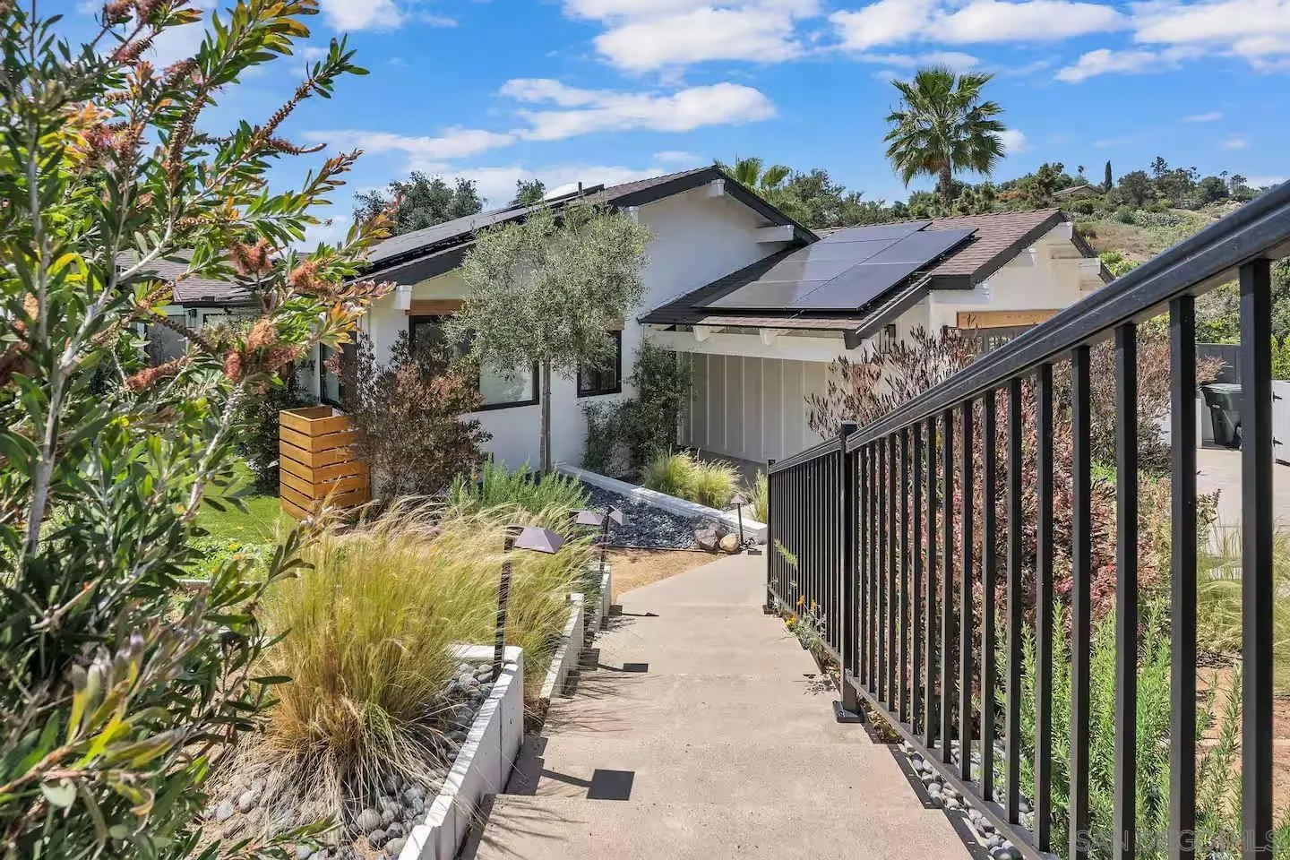 3550 Laketree Drive Fallbrook, CA 92028 - Photo 48 of 56 a view of a pathway of a house with wooden fence