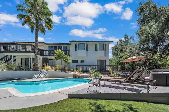 a view of yard with patio