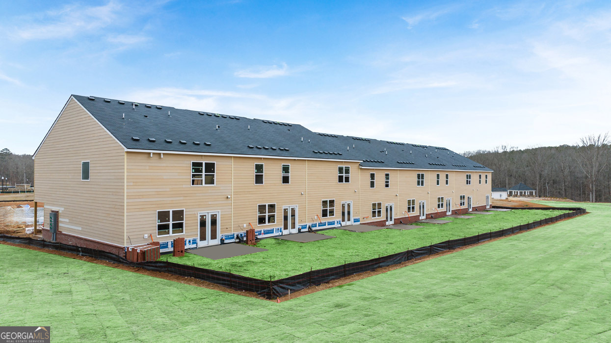 266 Sound Circle Stockbridge, GA 30281 - Photo 20 of 39 a view of a house with backyard and garden