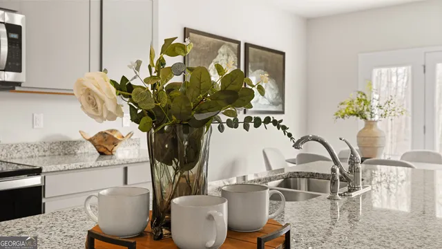a view of a dining room with furniture