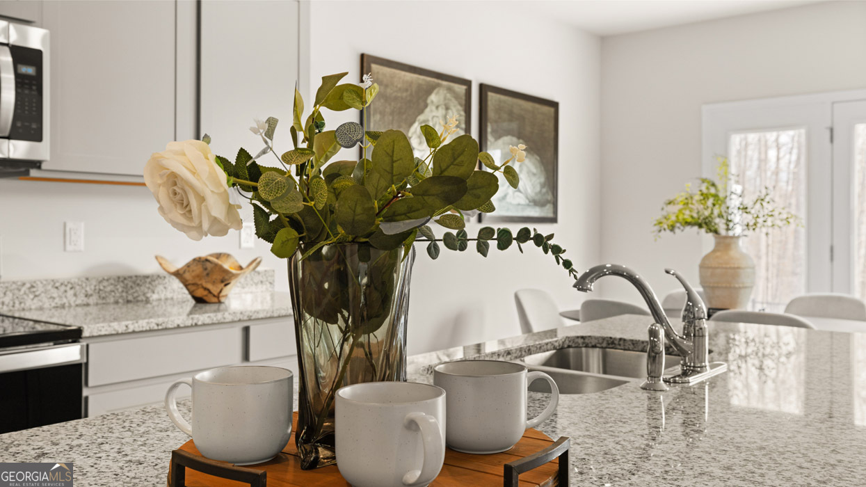 266 Sound Circle Stockbridge, GA 30281 - Photo 7 of 39 a view of a dining room with furniture