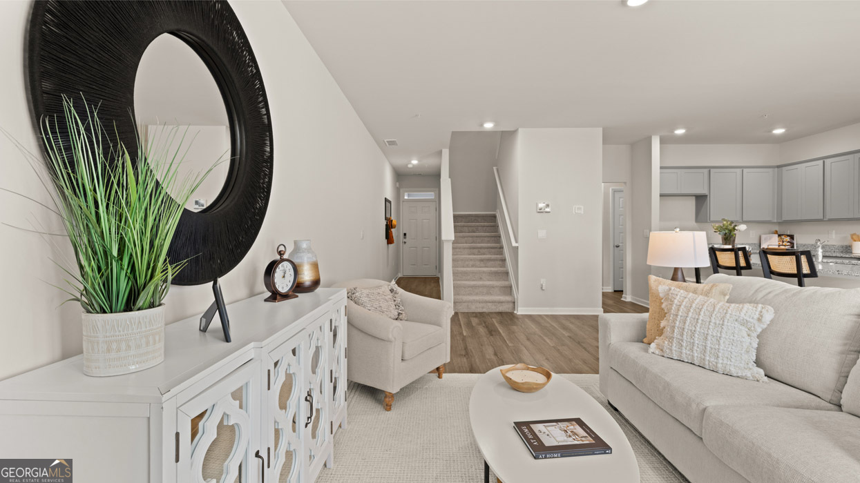 266 Sound Circle Stockbridge, GA 30281 - Photo 10 of 39 a living room with furniture and a mirror