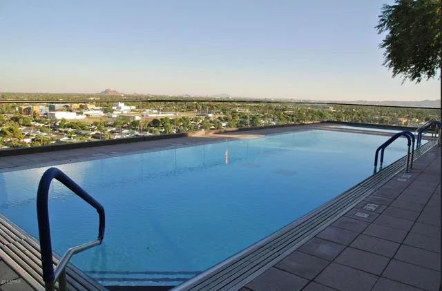 a view of balcony with furniture