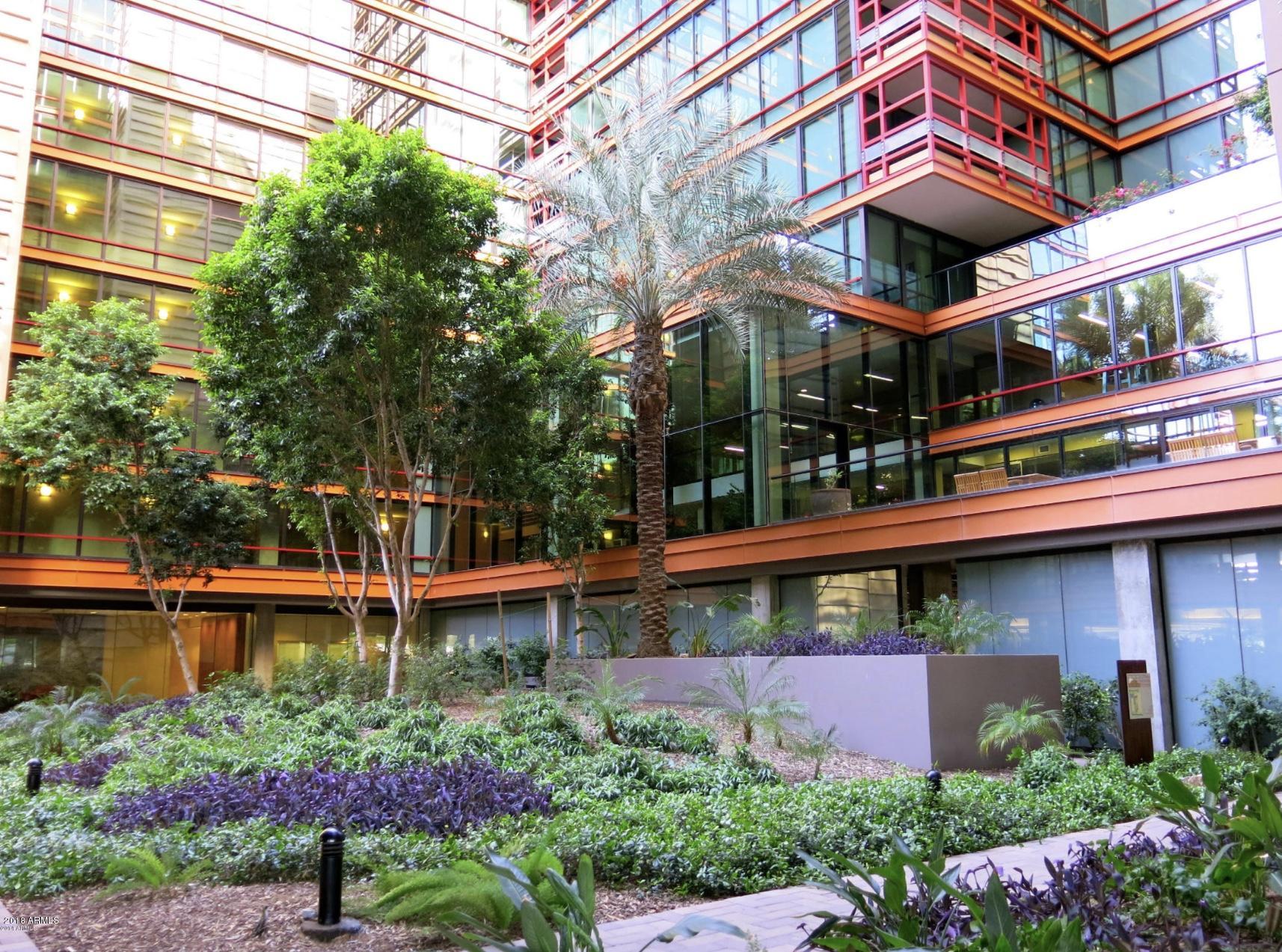 4808 North 24th Street, Unit 606 Phoenix, AZ 85016 - Photo 7 of 11 front view of a building with a garden