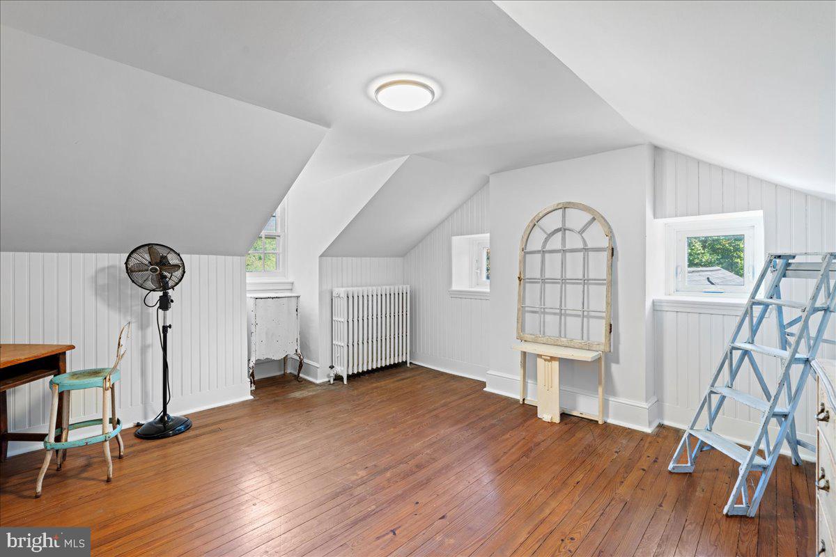 1111 Susquehanna Road Jenkintown, PA 19046 - Photo 44 of 64 a view of an empty room with wooden floor and a window