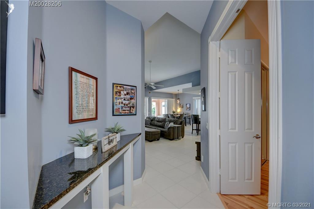 1530 Southwest Balmoral Trace Stuart, FL 34997 - Photo 28 of 48 Hallway and entrance to bedroom 3