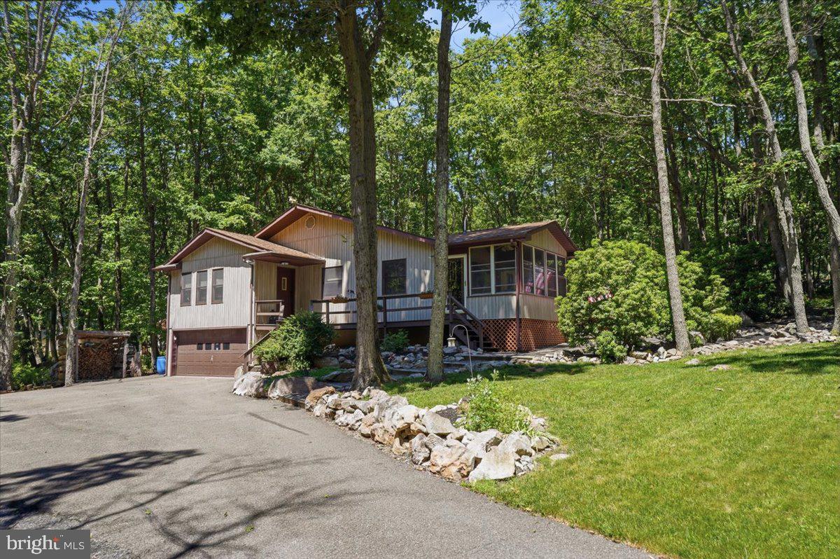 177 Jay Effort, PA 18330 - Photo 4 of 47 Charming home nestled in lush greenery.