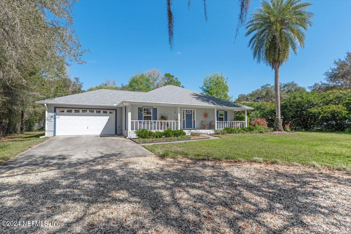 6481 Brooklyn Bay Road Keystone Heights, FL 32656 - Photo 1 of 45 a front view of a house with a yard