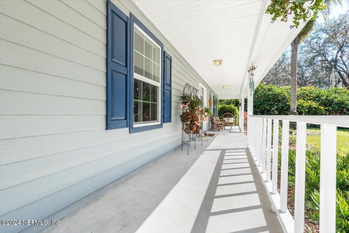 6481 Brooklyn Bay Road Keystone Heights, FL 32656 - Photo 6 of 45 a view of a house with a porch