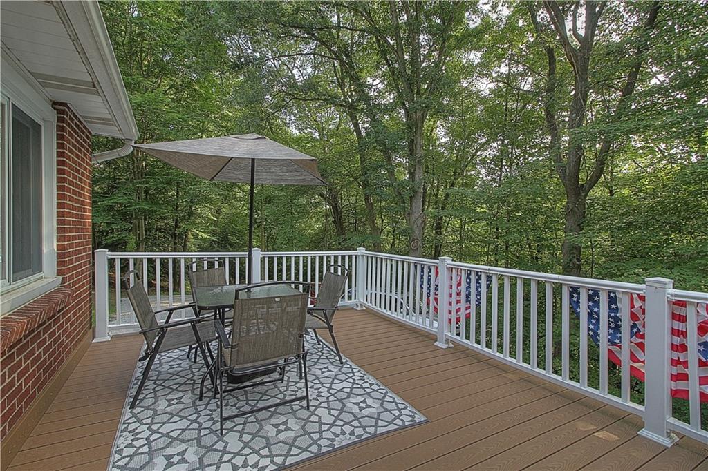 687 Park Road Beaver Falls, PA 15010 - Photo 16 of 22 DECK located off the Main Floor Living Room. Feel like you are in the trees! Plenty of room for a grill and furniture. New composite wood and railing.