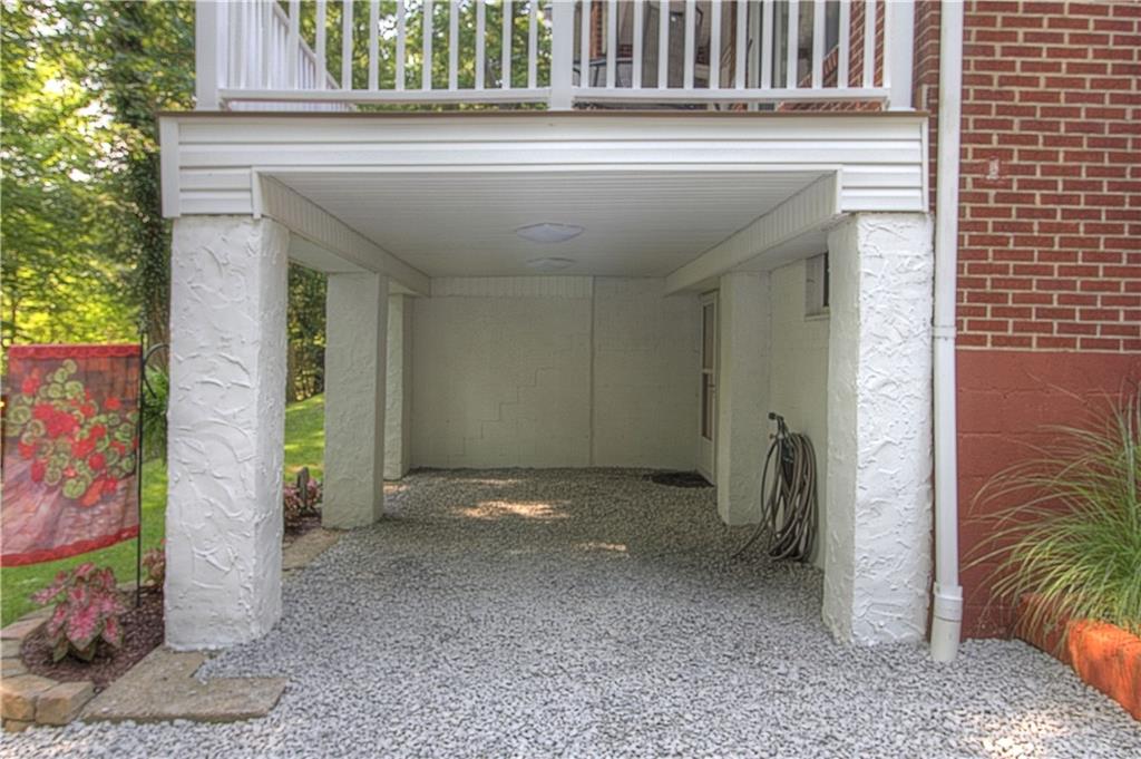 687 Park Road Beaver Falls, PA 15010 - Photo 17 of 22 CARPORT provides covered access to the Lower Level. There are plenty of additional graveled parking spaces.