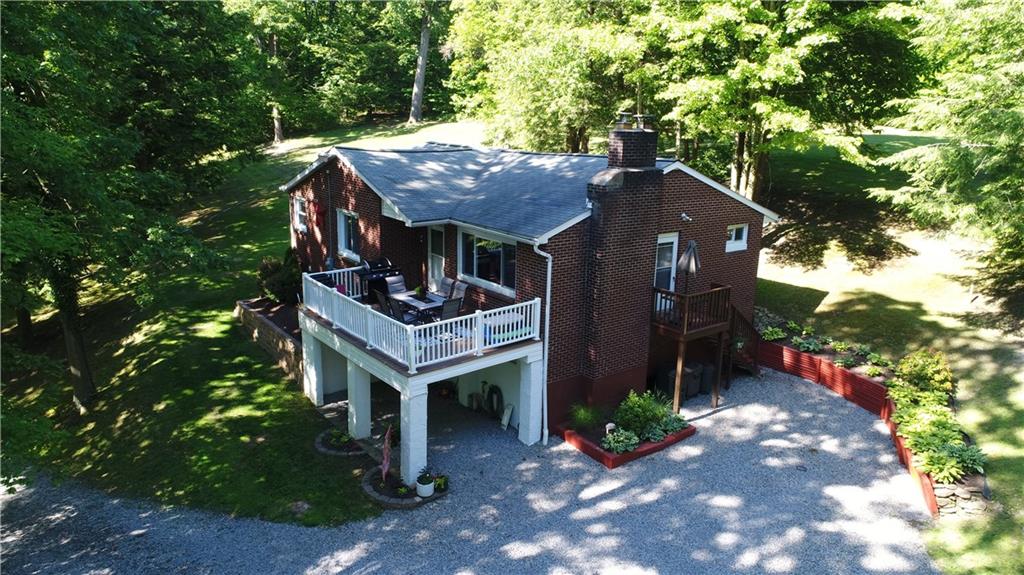 687 Park Road Beaver Falls, PA 15010 - Photo 21 of 22 Aerial view of the home and a section of the parking area.