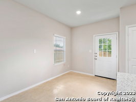 7356 Misty Ridge Drive, Unit 5 Converse, TX 78109 - Photo 2 of 25 an empty room with windows