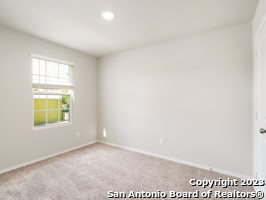 7356 Misty Ridge Drive, Unit 5 Converse, TX 78109 - Photo 7 of 25 an empty room with windows