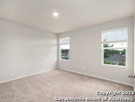 7356 Misty Ridge Drive, Unit 5 Converse, TX 78109 - Photo 9 of 25 an empty room with windows