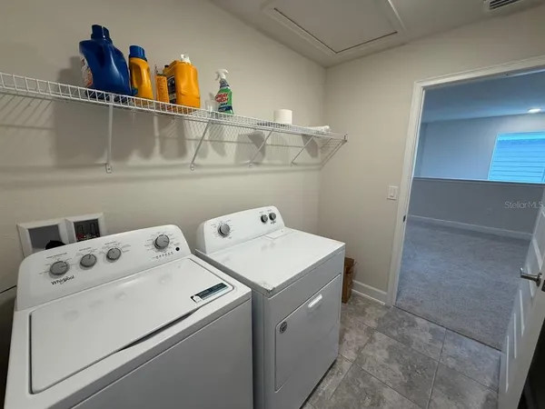 a view of a room with racks on the wall