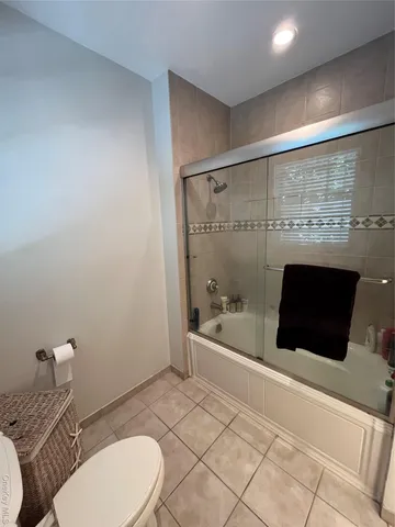 a bathroom with a toilet and a sink
