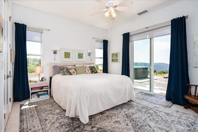 a view of a dinning table and chairs in the patio