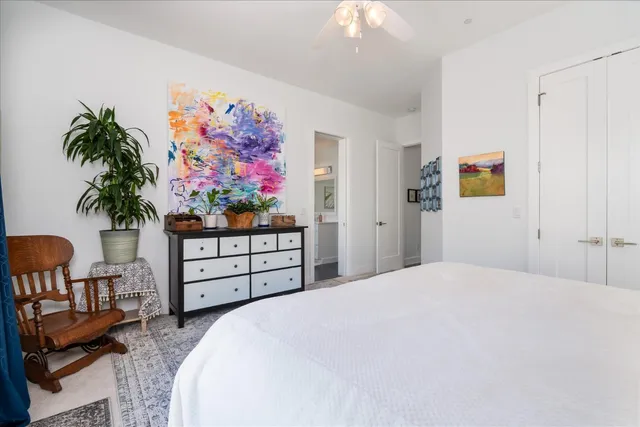 a view of a house with backyard porch and sitting area