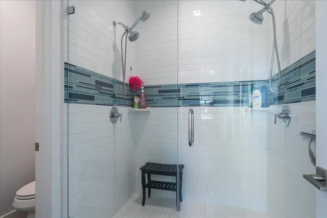 a view of a green field with lots of bushes