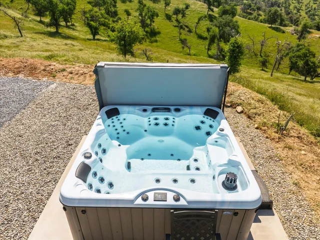 a view of a yard with an outdoor space