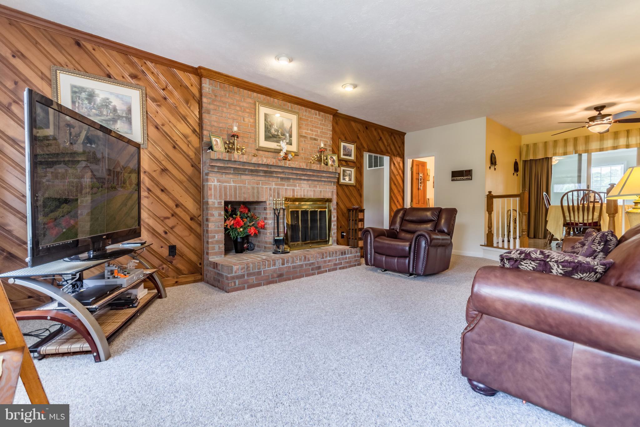 Family Room w/ Woodburning Fireplace