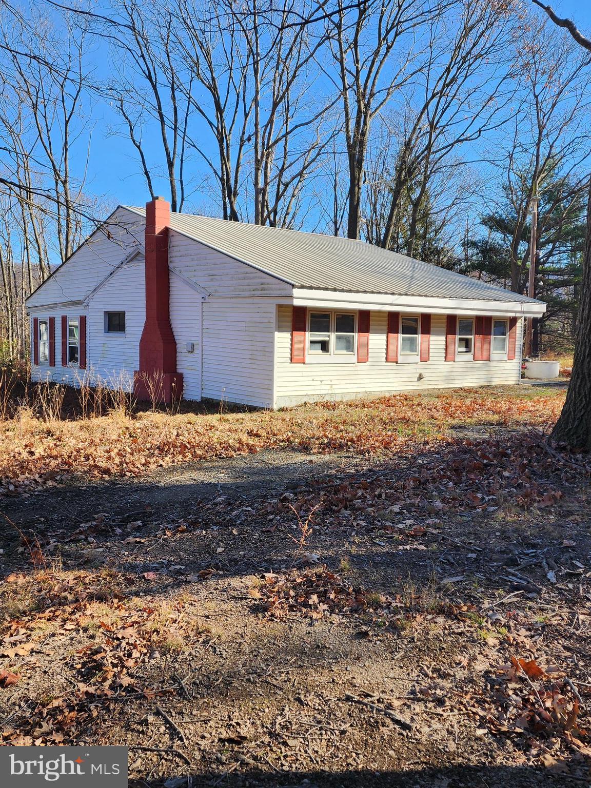 15689 Ridge Road Fort Loudon, PA 17224 - Photo 1 of 24 a front view of a house with a yard