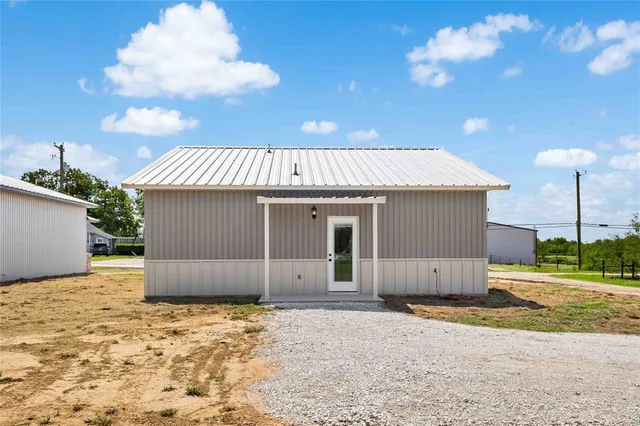 a view of a bathroom that has a window