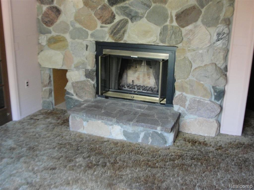 12435 Fish Lake Road Holly, MI 48442 - Photo 11 of 12 mstbdrmfireplace.JPG