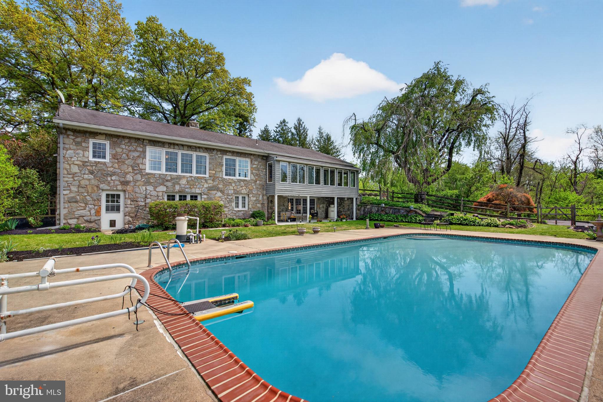 300 Sanatoga Road Pottstown, PA 19465 - Photo 14 of 79 Charming stone home with serene poolside.