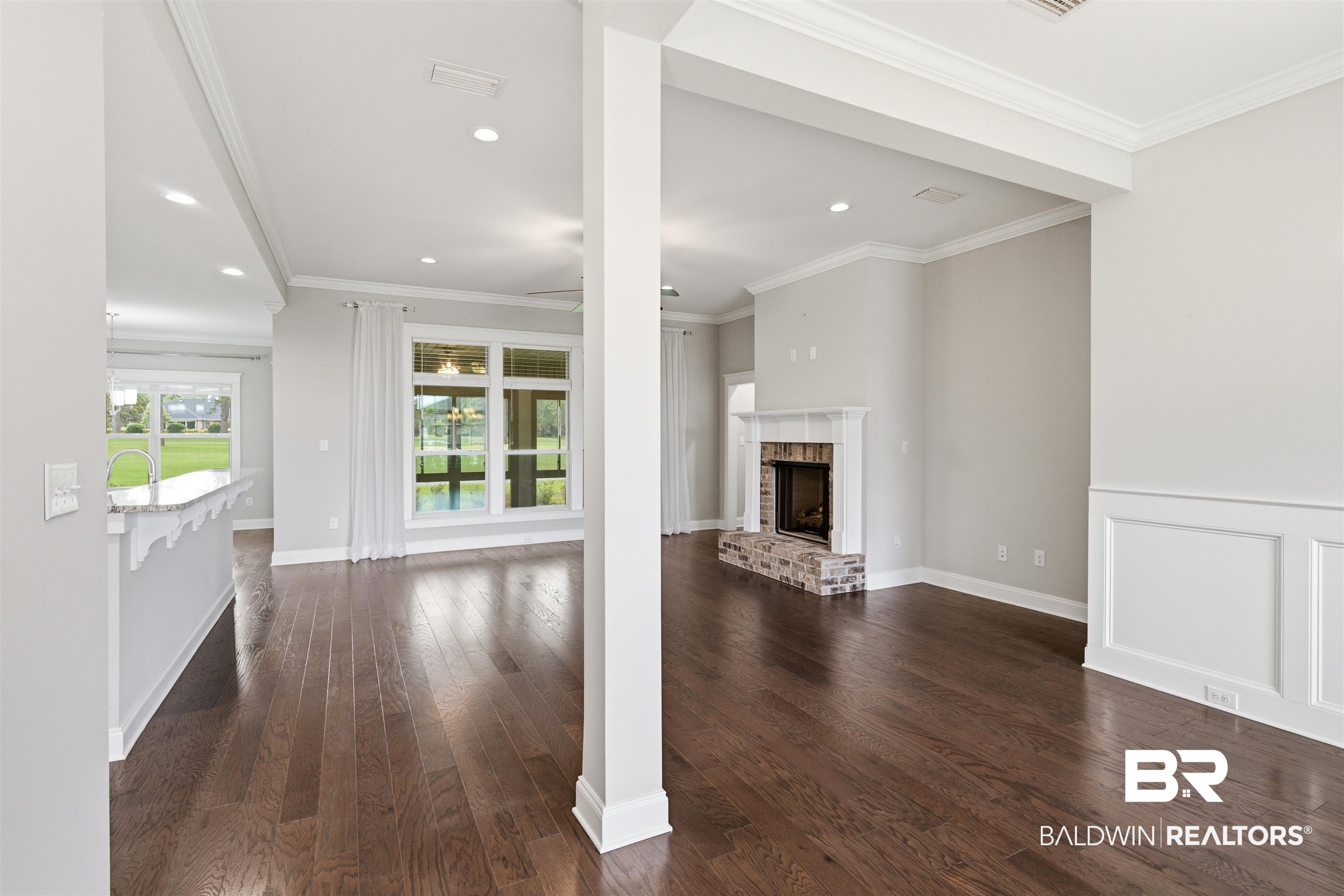 245 Divot Loop Fairhope, AL 36532 - Photo 5 of 26 View of dining room and fireplace from front door