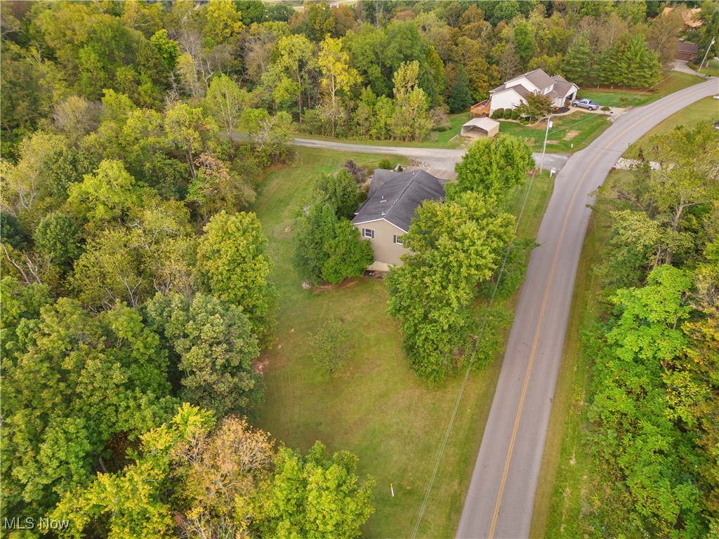 155 Ridgewood Boulevard Belpre, OH 45714 - Photo 7 of 49 Aerial view of property and surrounding area featuring a forest