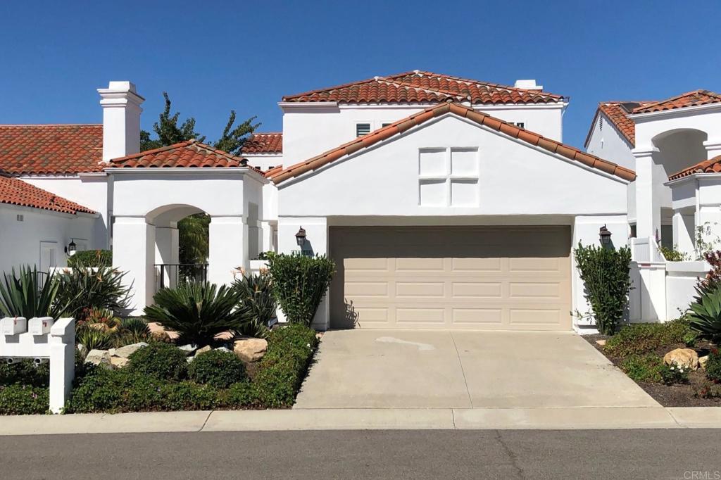 4926 Tilos Way Oceanside, CA 92056 - Photo 63 of 63 a front view of a house with garden