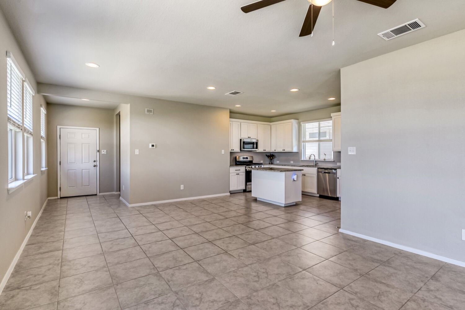 1310 Goforth Road Kyle, TX 78640 - Photo 9 of 24 Spacious interior featuring tile flooring throughout
