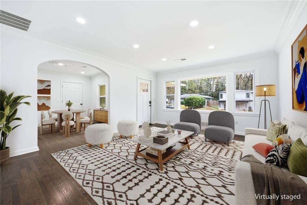 2277 Edgemore Drive Southeast Atlanta, GA 30316 - Photo 6 of 48 a living room with furniture and a potted plant