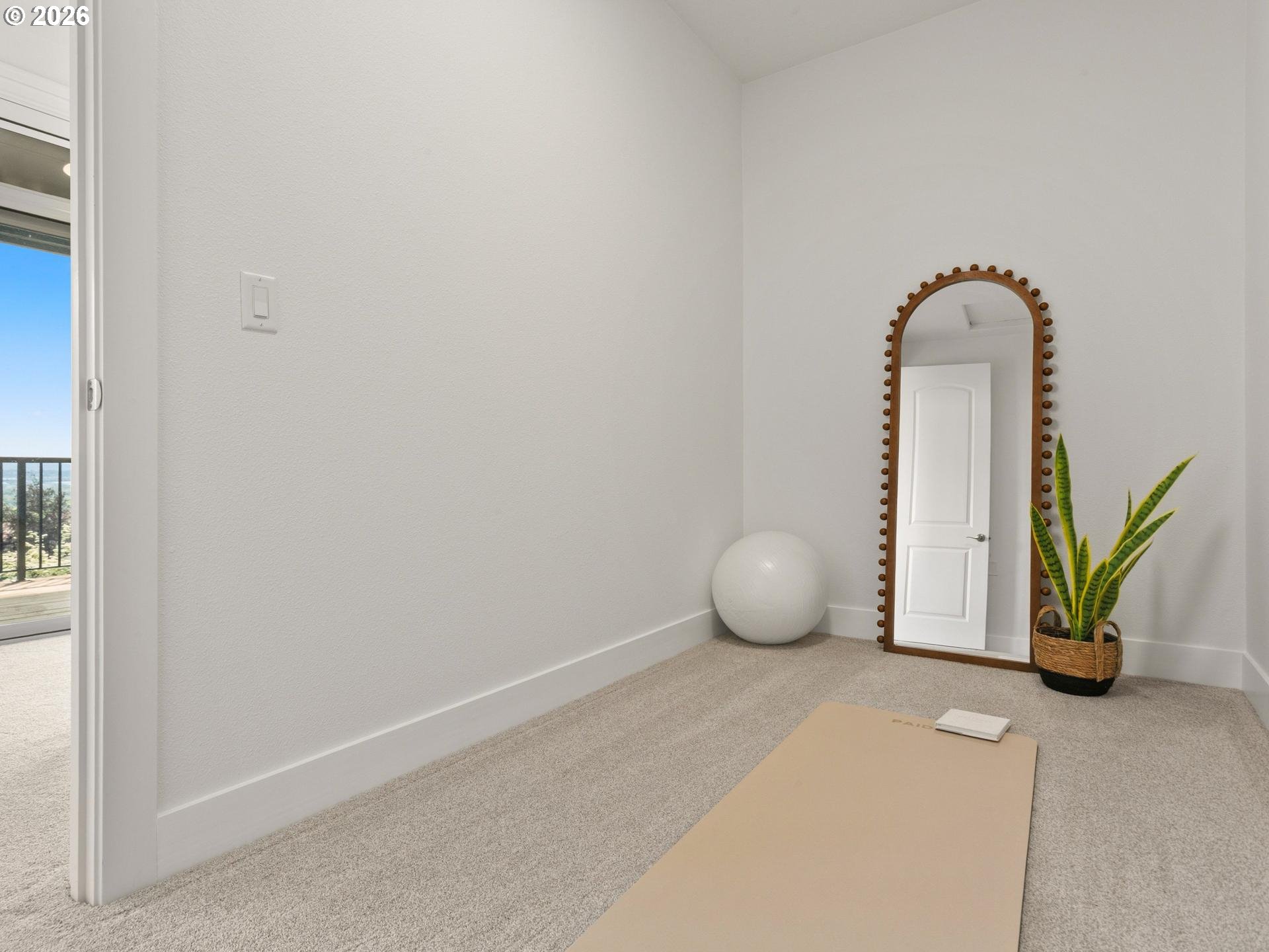 1012 Northwest Goodwin Street Camas, WA 98607 - Photo 21 of 44 a view of a room with wooden floor and potted plant