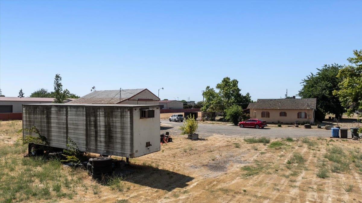 140 Swanson Road Manteca, CA 95337 - Photo 17 of 26 a view of a house with a yard covered with snow in the background