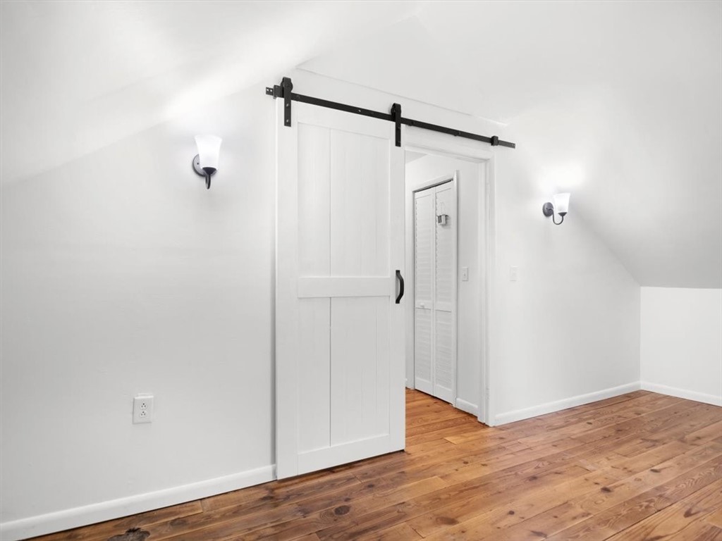 11047 Wilson Road Huron, NY 14590 - Photo 31 of 45 Sliding barn door for Bedroom 4