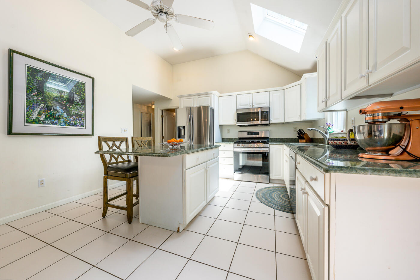 5 Oldham Road Osterville, MA 02655 - Photo 6 of 29 a kitchen with a stove a sink and a microwave