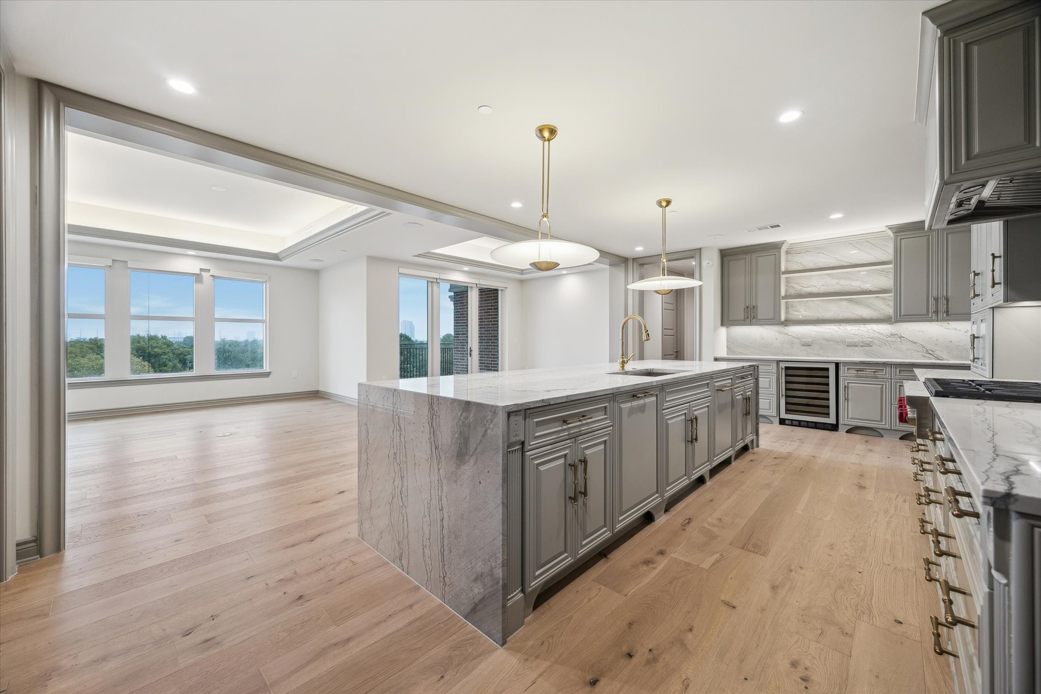 1717 Bissonnet Street, Unit 508 Houston, TX 77005 - Photo 4 of 34 a kitchen with stainless steel appliances granite countertop a stove and a wooden floors