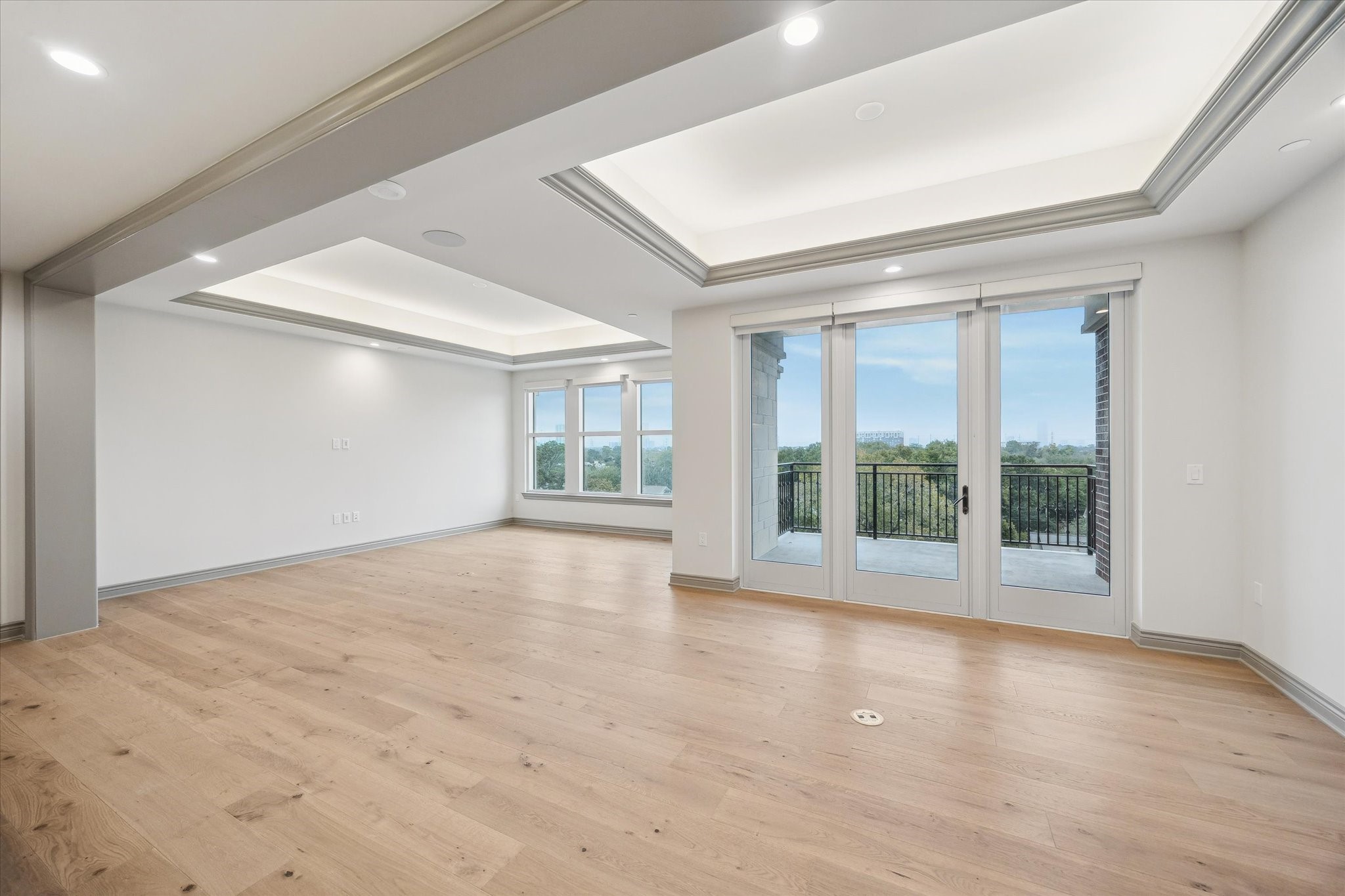 1717 Bissonnet Street, Unit 508 Houston, TX 77005 - Photo 9 of 34 a view of an empty room with a window and wooden floor