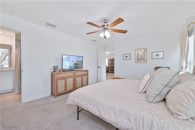 a bathroom with a double vanity sink and mirror