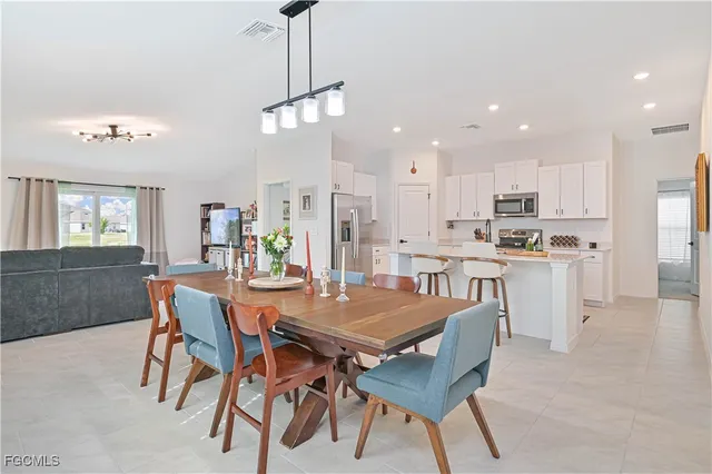 a view of a dining room with furniture