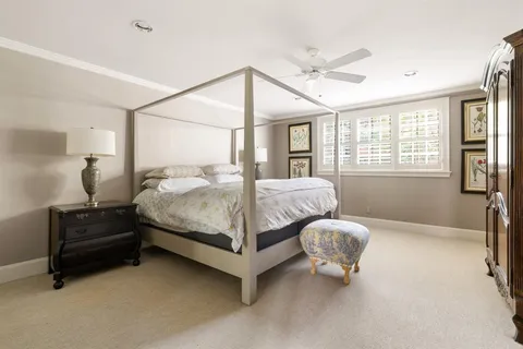 a bathroom with 2 sink toilet and tub