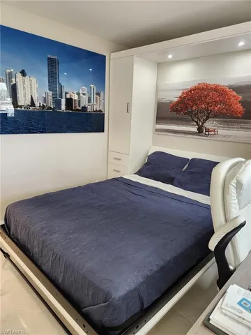 a view of bedroom with furniture