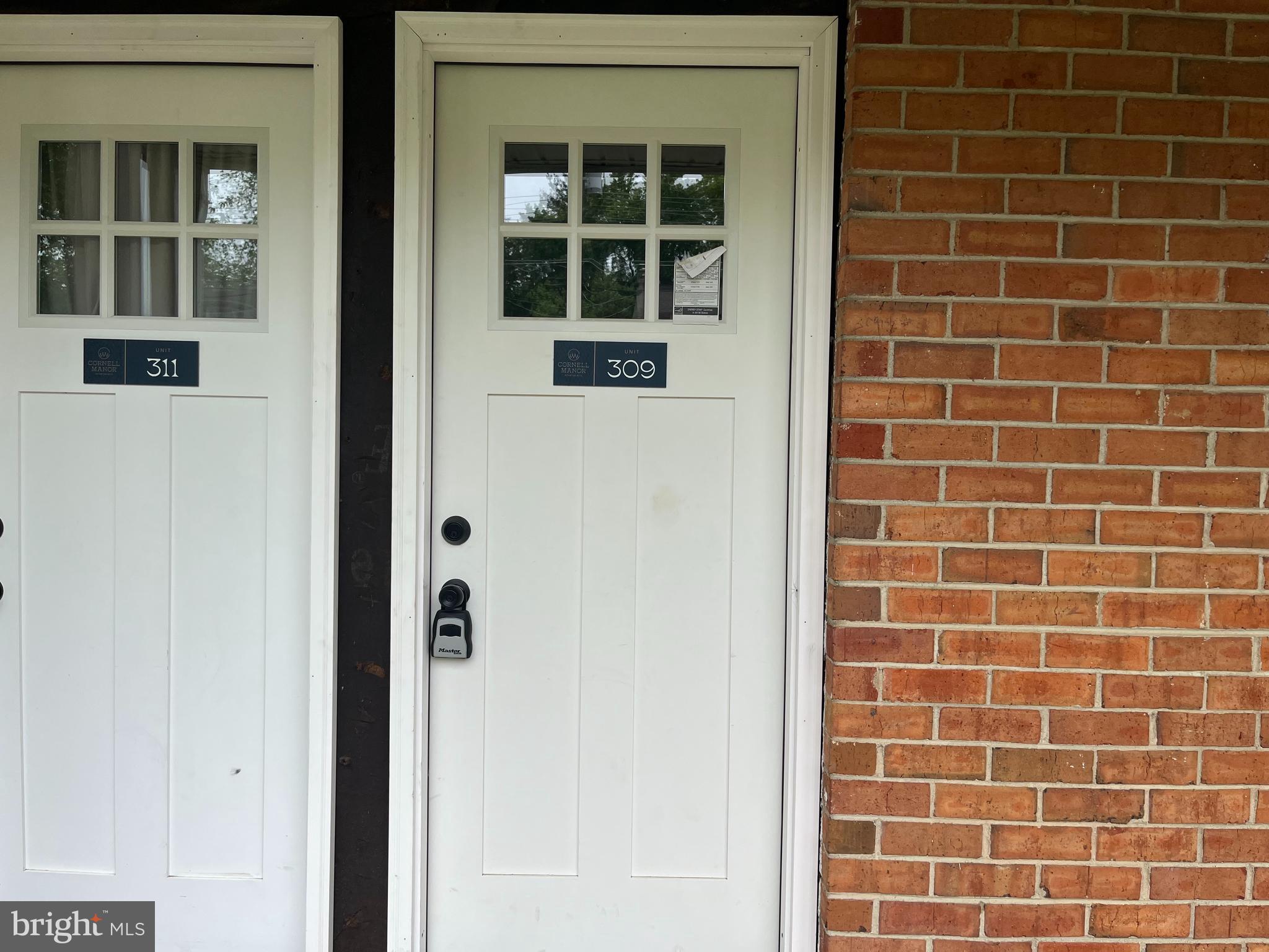 319 Columbia Avenue, Unit 227 Stratford, NJ 08084 - Photo 1 of 13 a bathroom with a window and a shower