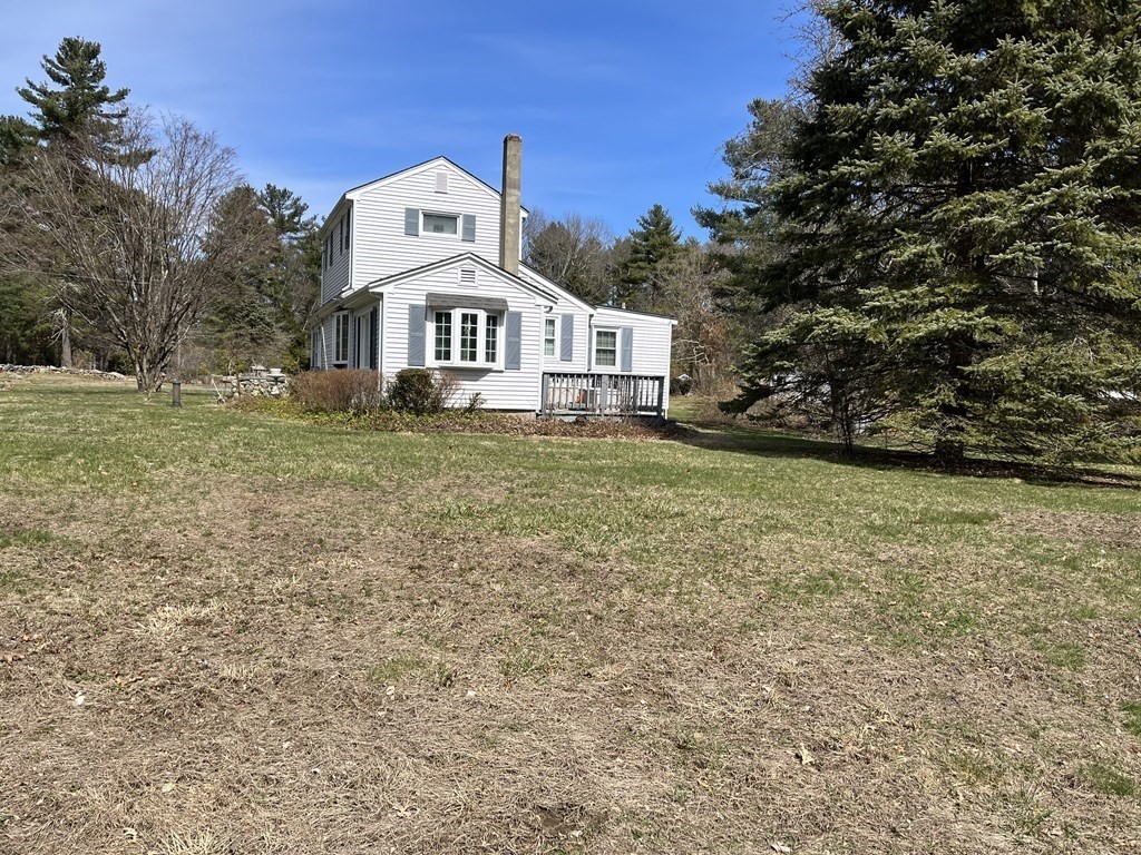 2550 Bay Road Stoughton, MA 02072 - Photo 4 of 20 a view of a house with a yard