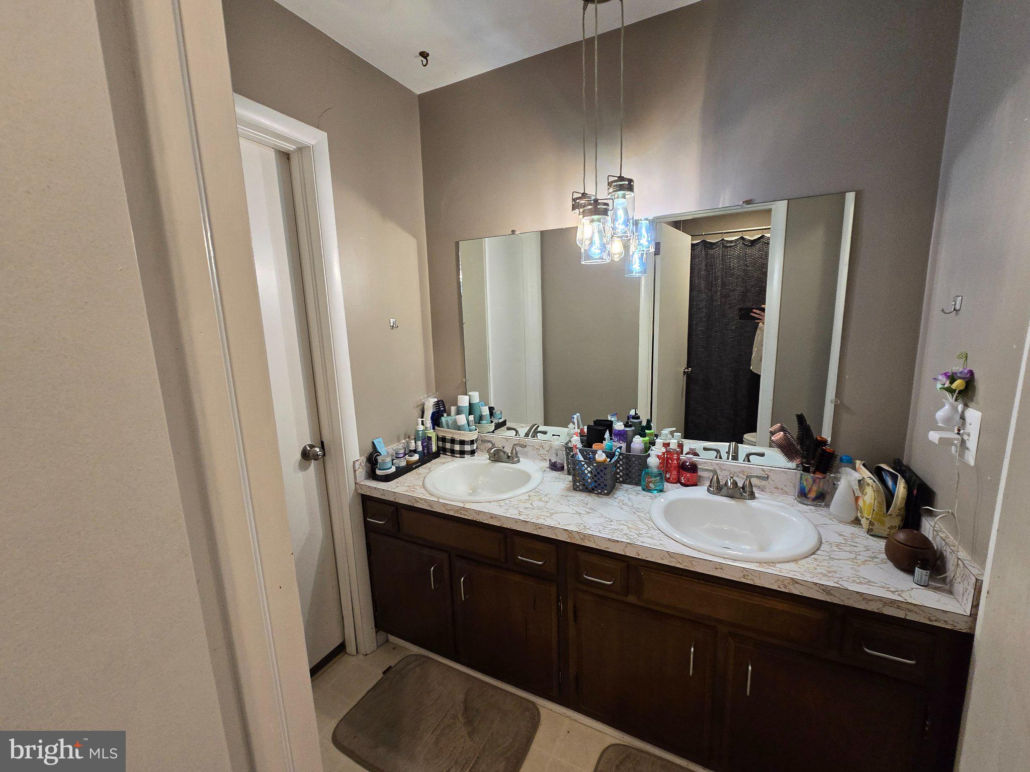 107 Keystone Hls Road, Unit 404 Factoryville, PA 18419 - Photo 14 of 27 Modern bathroom with elegant lighting.